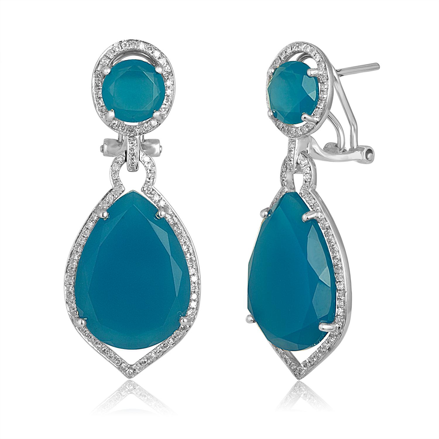 Very Fun Blue Colored Agate Earrings
The earrings are 14K White Gold.
There are 0.44ct in G/H SI Diamonds.
There are 19.21ct in Blue Agate.
The earrings measure 1.5