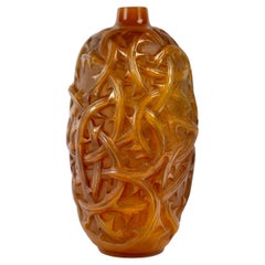 1921 René Lalique - Vase Ronces Verre caramel ciselé à patine grise