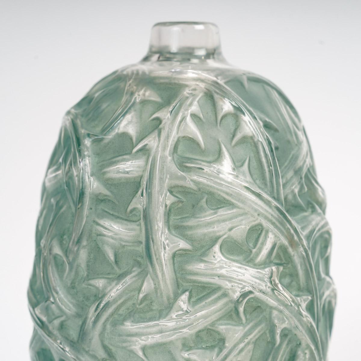 Molded 1921 René Lalique Vase Ronces in Clear & Frosted Glass with Green Patina