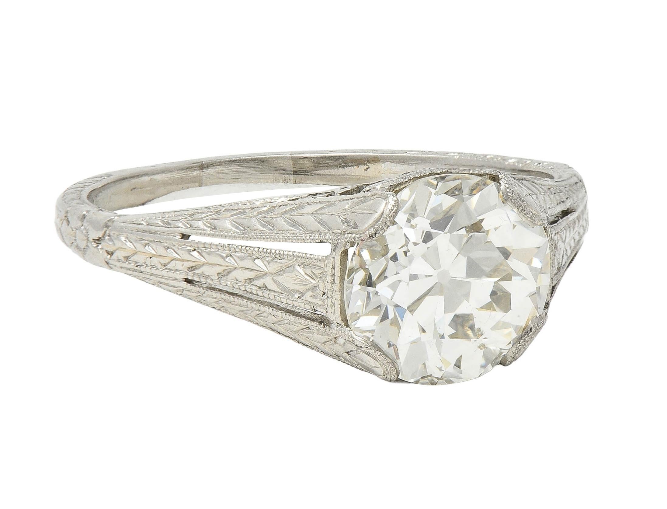 Round Cut 1922 Art Deco 1.79 CTW Diamond Platinum Scrolled Lotus Antique Engagement Ring For Sale