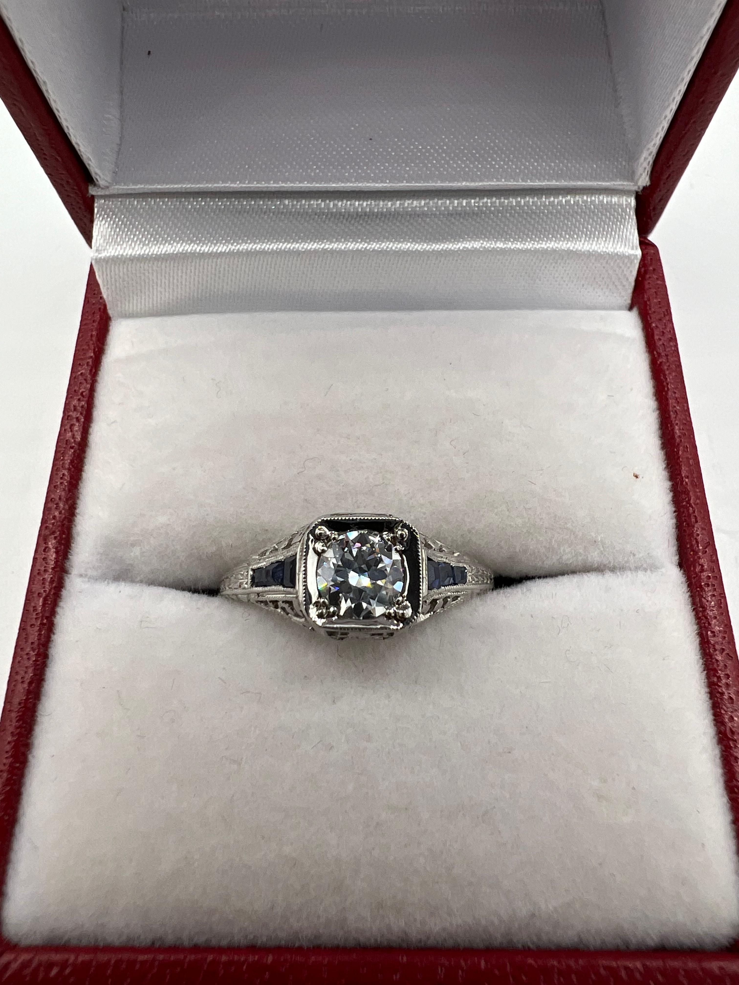 Antique Art Deco diamond platinum engagement ring, circa 1922.

The Art Deco antique diamond platinum engagement ring is engraved inside the shank 
