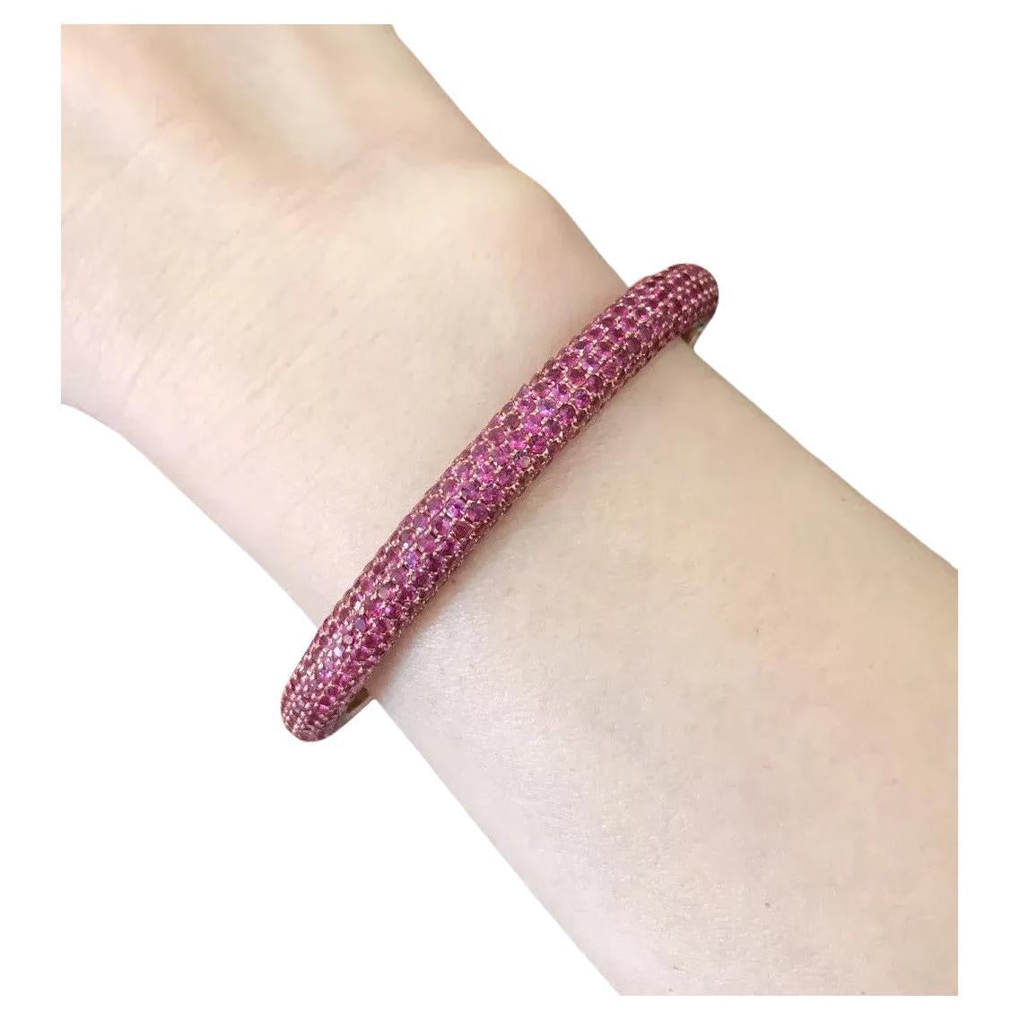 19.22 Carats Total Weight Ruby Pave Oval Bangle Bracelet in 18k Rose Gold

Oval Shaped Pave Bangle Bracelet features 19.22 carats Round Rubies Pave set in 18k Rose Gold. Bangle has a hidden twist hinged opening.

Total ruby weight is 19.22