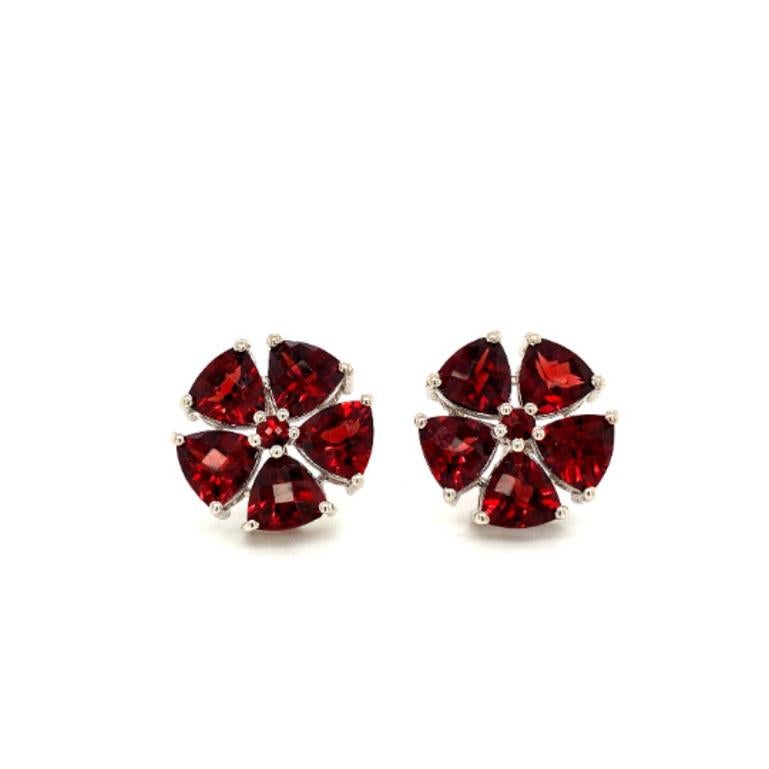19.22 CTW Genuine Garnet Floral Stud Earrings in sterling silver to make a statement with your look. You shall need stud earrings to make a statement with your look. These earrings create a sparkling, luxurious look featuring trillion, round cut