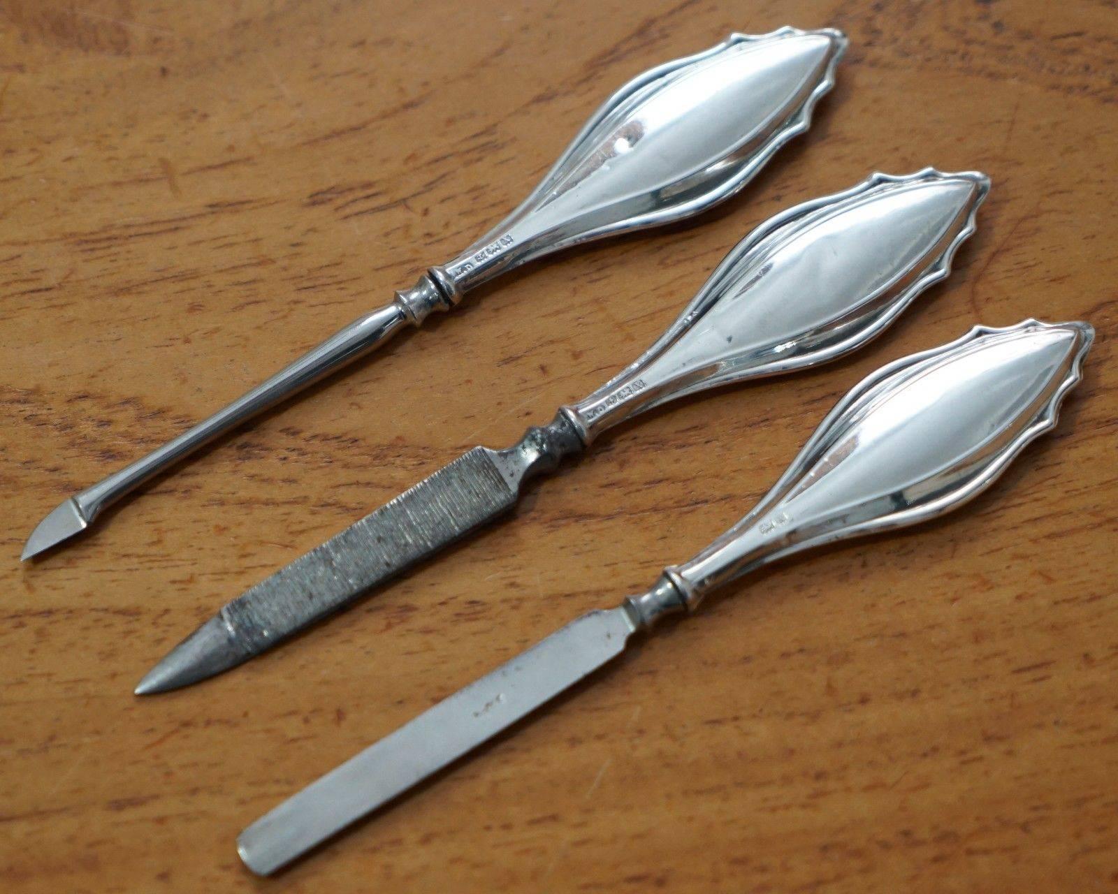 We are delighted to offer for sale this lovely sterling silver handled manicure set

A lovely set of three pieces, you have the cuticle press, a nail file and then scraper, each piece is stamped and hallmarked on both sides, the lion for Sterling,