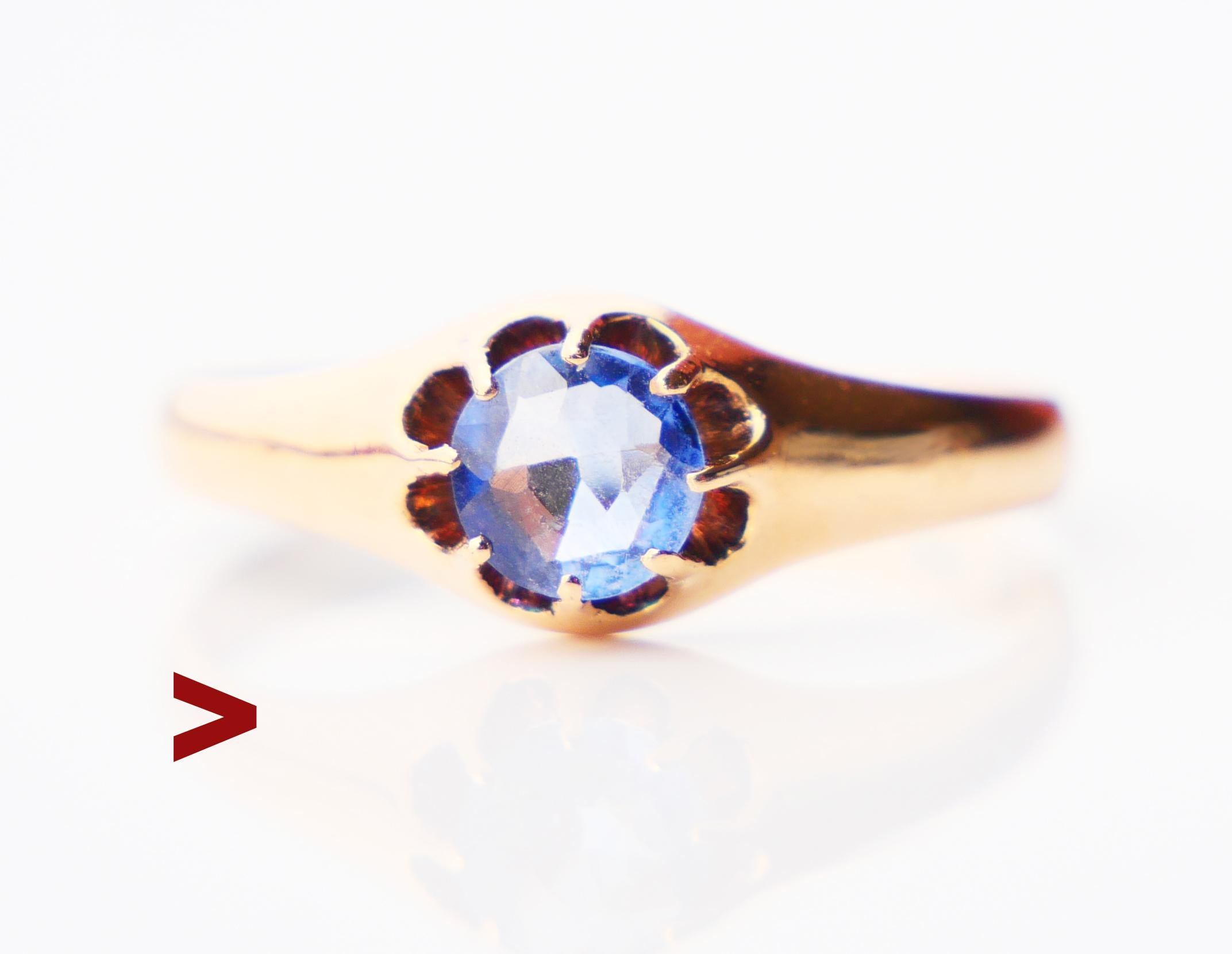 A ring from the distant Art Deco period featuring an 18K Rose Gold sleekly band + old European diamond cut natural Sapphire Ø 5 mm x 2 mm deep / ca. 0.7 ct. Stone is of light Blue / likely Ceylon Cornflower variety with very minor inclusions and