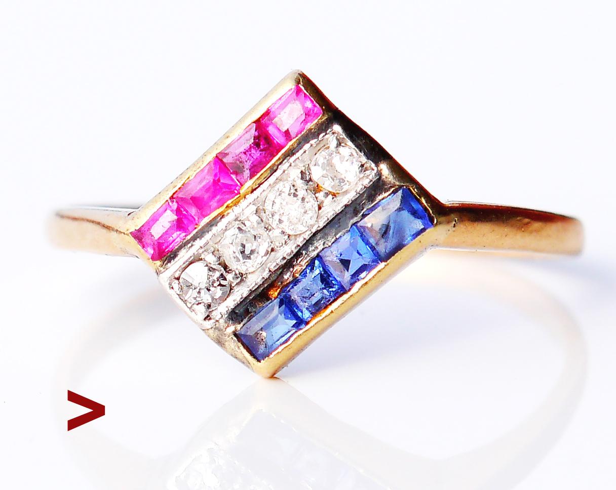 Ring created in 1924, the band in solid 18K Yellow Gold decorated with three rows of 12 natural Rubies, Diamonds, and Sapphires.

Rubies and Sapphires ca 1.8 mm x 1.5 mm /ca 0.03ct each/ demonstrate inclusions and internal flaws.

Old European