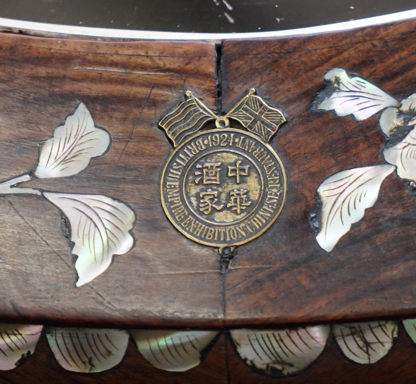 We are delighted to this very rare Chinese rosewood or exquisite mother of pearl inlay occasional centre table stamped for the 1924 British Empire Chinese exhibition

This table is as fine as they come, its solid rosewood with a glorious patina,