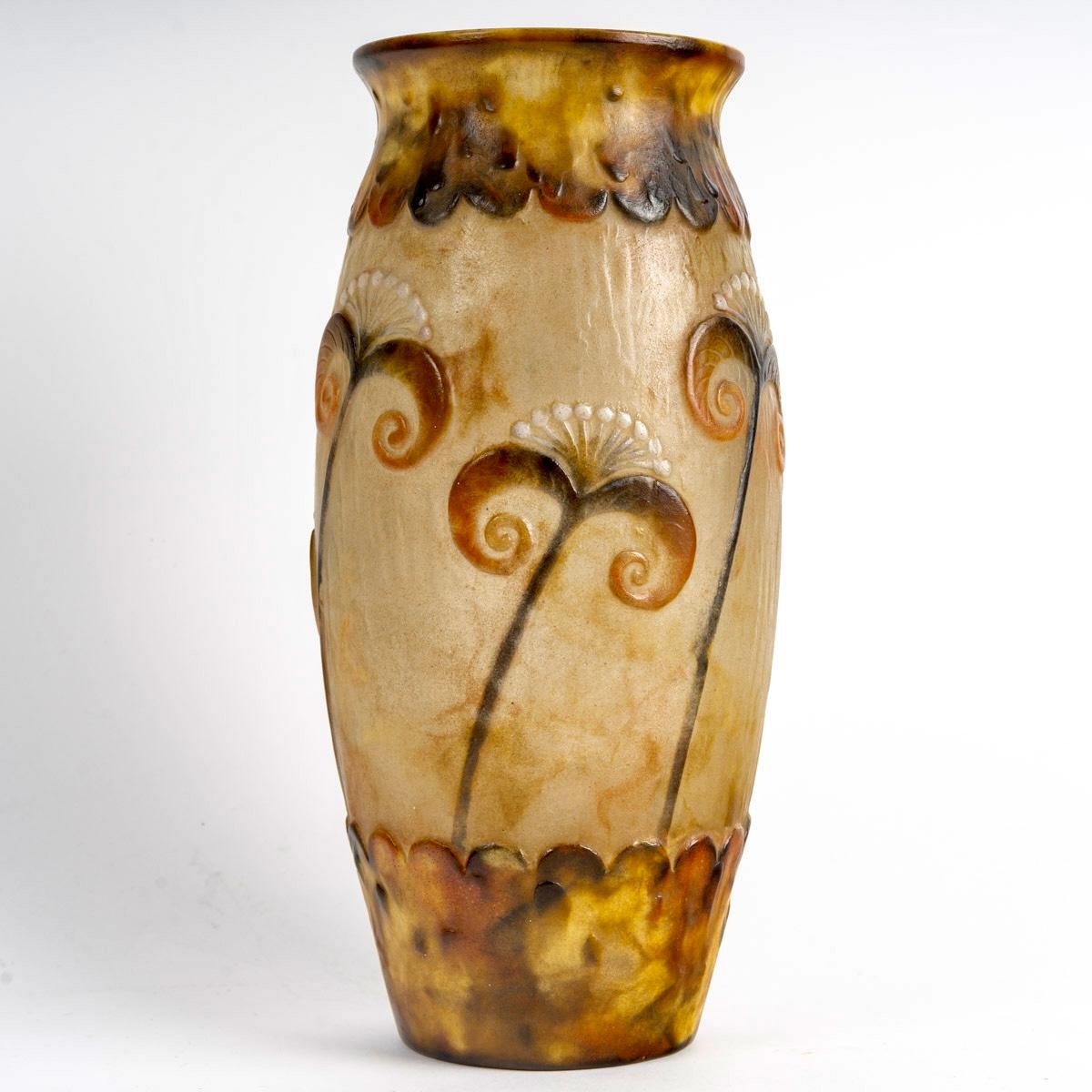 Vase “Papyrus” made in marbled yellow, brown, orange and white glass pate de verre by Gabriel Argy-Rousseau in 1924.
Molded signature.

Perfect condition. Exceptional colors.

height: 26 cm

Janine Bloch-Dermant, Catalogue Raisonné des Pâtes de