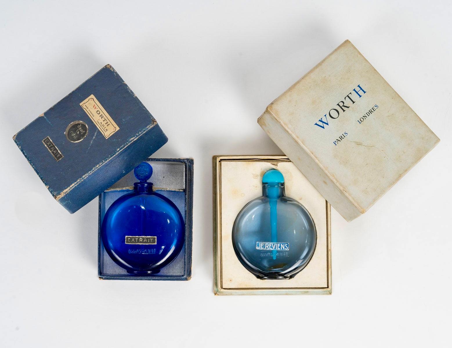 Coppia di bottiglie in vetro blu 