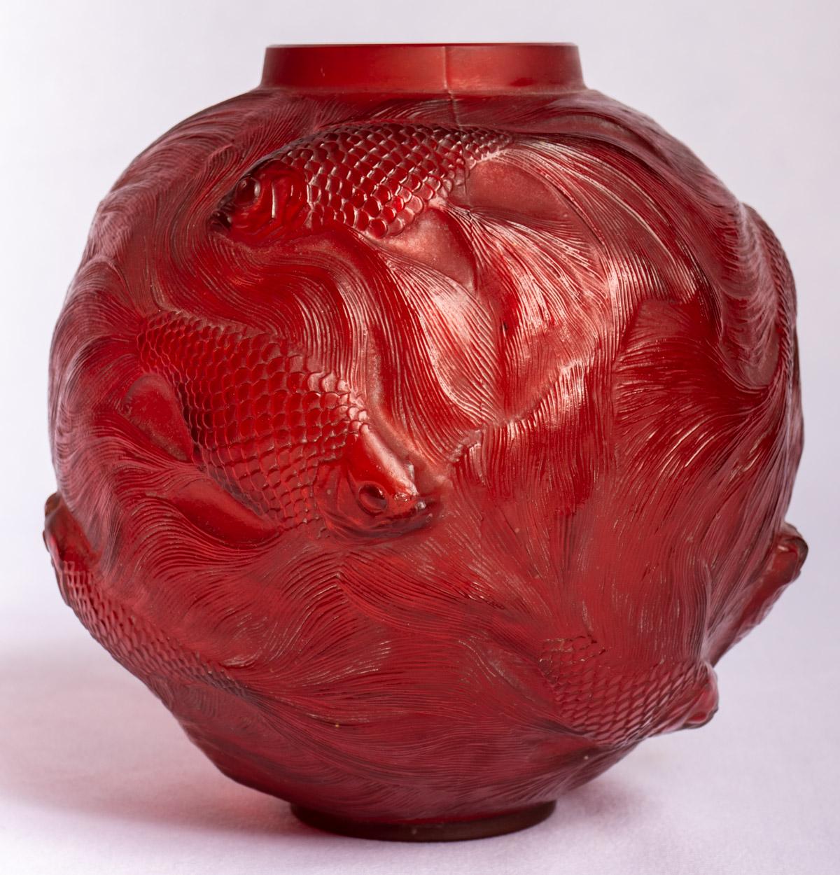 Vase “Formose” made in cherry red glass by René Lalique created in 1924.
Molded signature on bottom.

Perfect condition. Wonderful model and very rare color. 

height: 17 cm

Félix Marcilhac, René Lalique - Catalogue Raisonné de l'Œuvre de Verre,