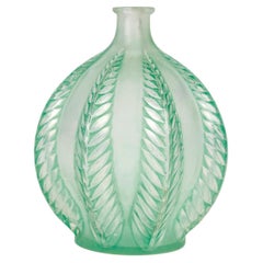 1924 René Lalique, Vase Malines Glass with green Patina