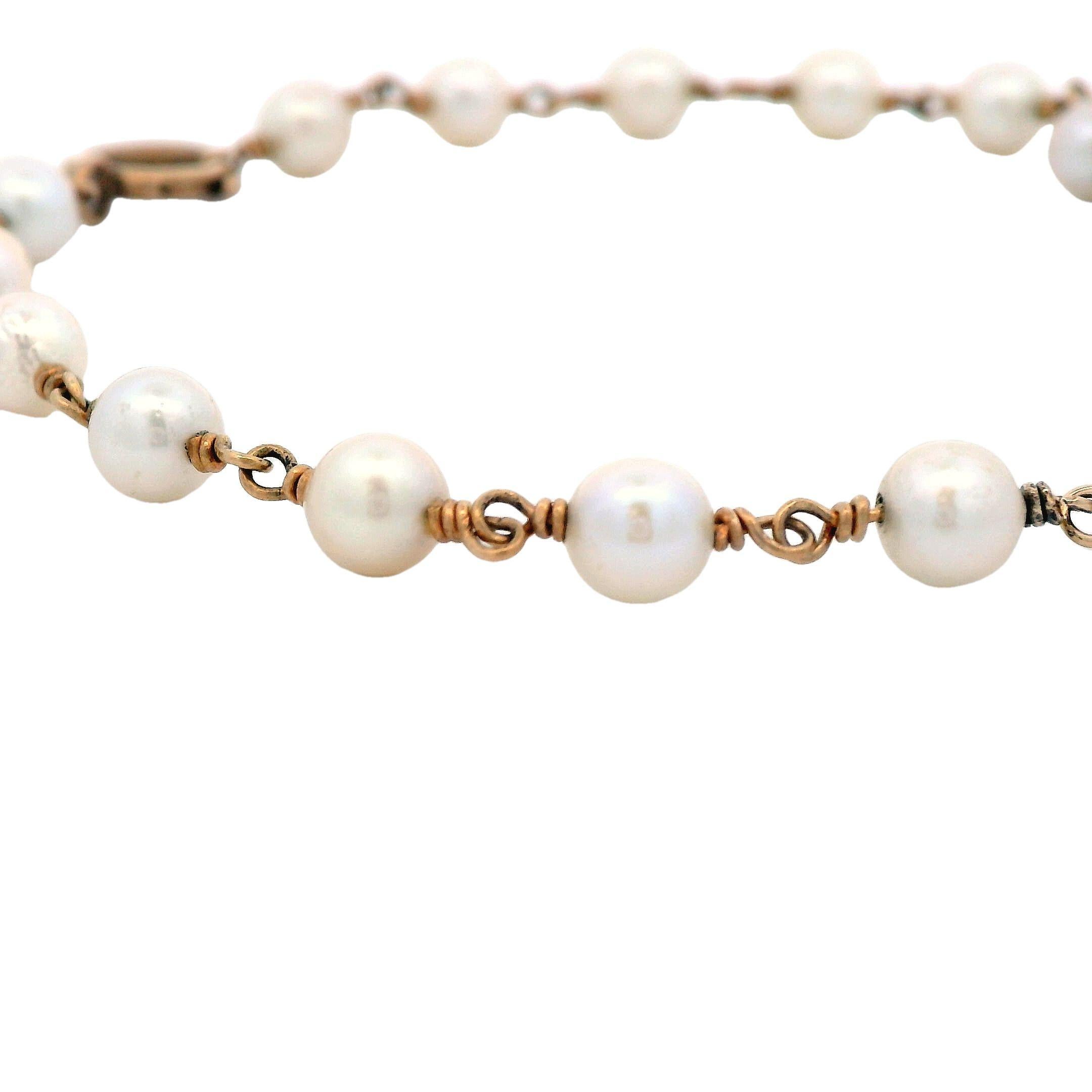 This stunning 14k rose gold bracelet comes from the 1925 Art Deco period and showcases 18 5mm pearls. The soft color of the rose gold beautifully compliments the shiney pearls, making for a bracelet that is perfect for a loved one. The 14k rose gold