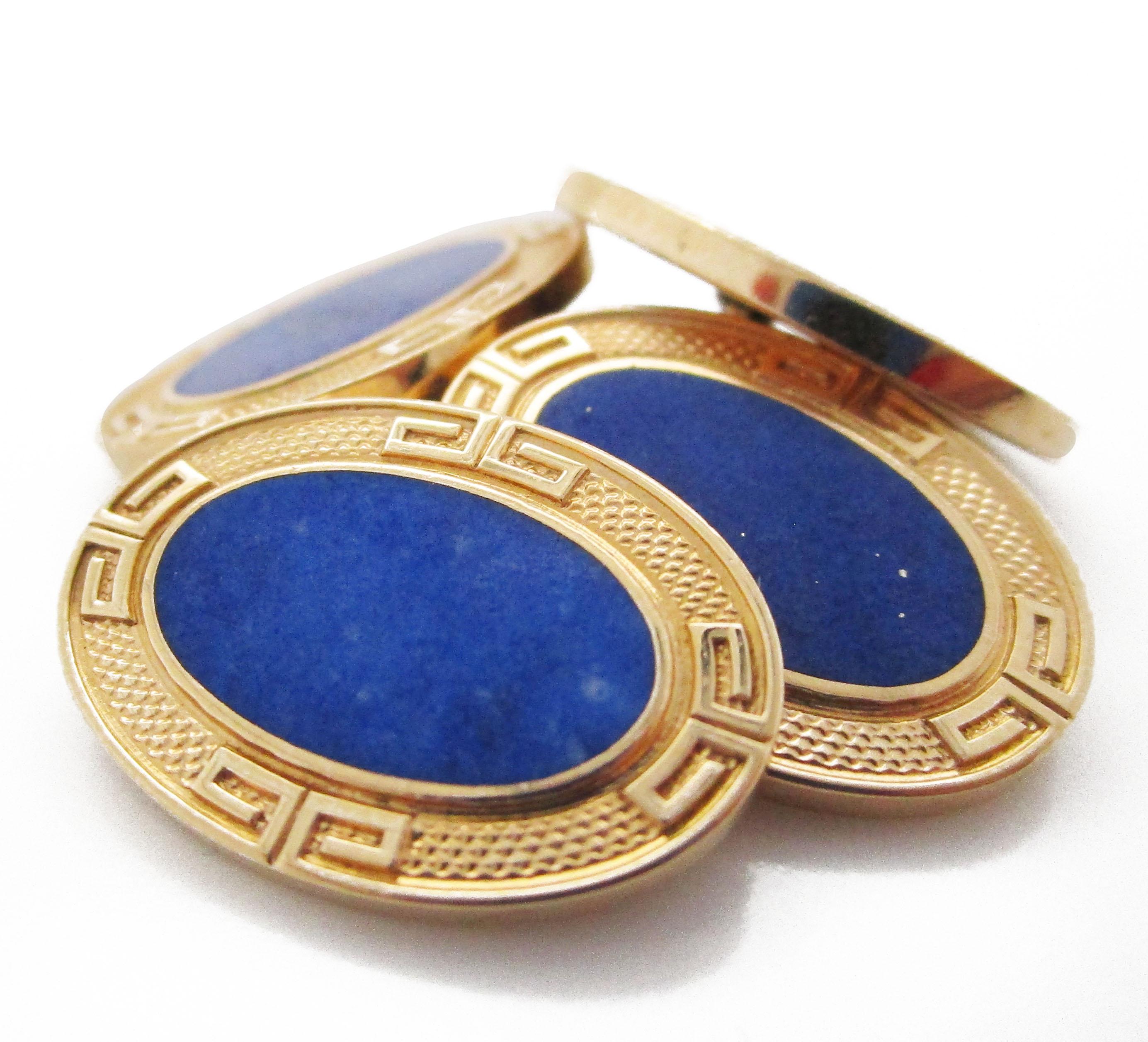 This magnificent set of cufflinks by Grogan and Co creates the ideal look of Art Deco elegance by combining rich 14k yellow gold and royal blue lapis insets. The deep blue of the lapis is the perfect complement for the bright 14k yellow gold Greek