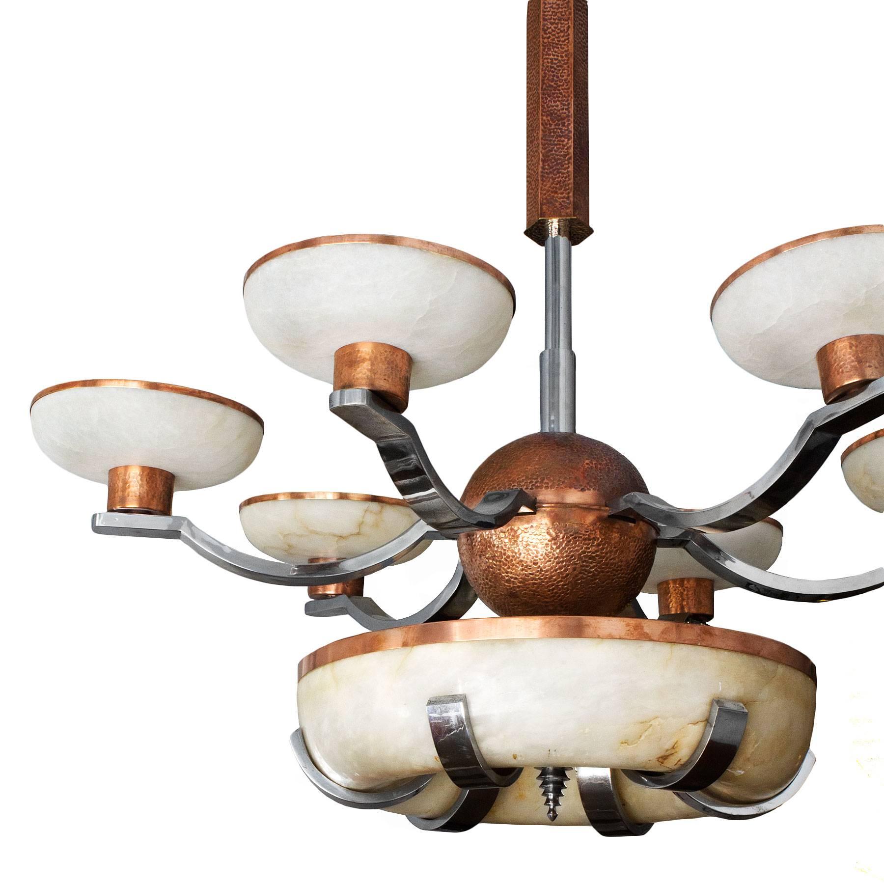 Monumental and spectacular Art Deco chandelier, six arms with small alabaster bowls and a big central bowl. Chrome-plated metal and hammered polished copper. Could be light the arms and the central bowl separately or together.

Spain, Barcelona,