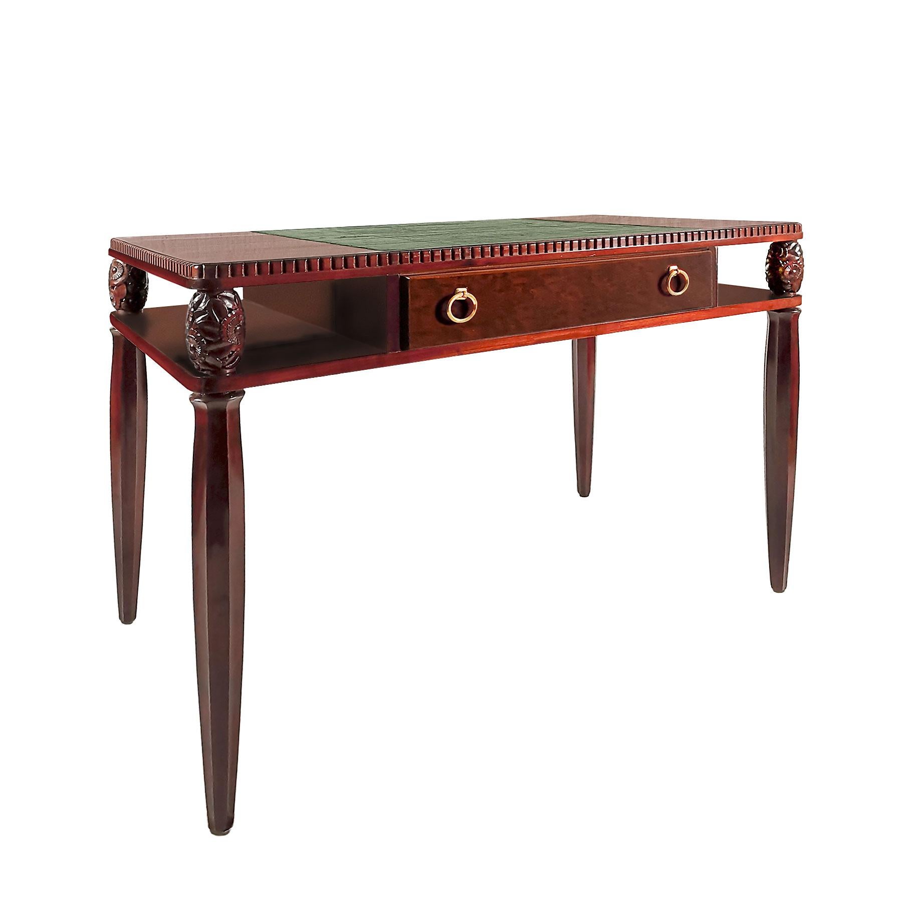 High quality Art Deco lady desk, solid mahogany and mottled mahogany veneer, faceted feet finished with four pine cones craved with floral decoration, French polish. Drawer with two polished brass handles. Top partially covered with the original