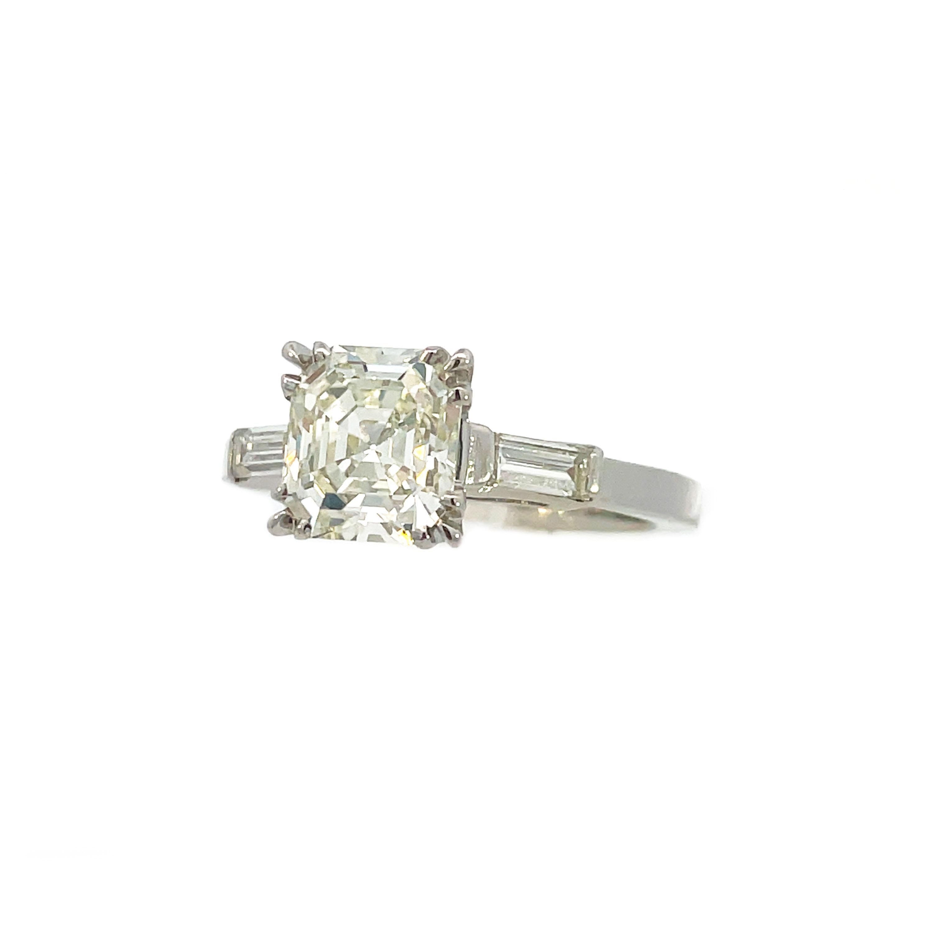 Women's 1925 Art Deco Platinum Asscher and Baguette Diamond Ring with GIA Report For Sale