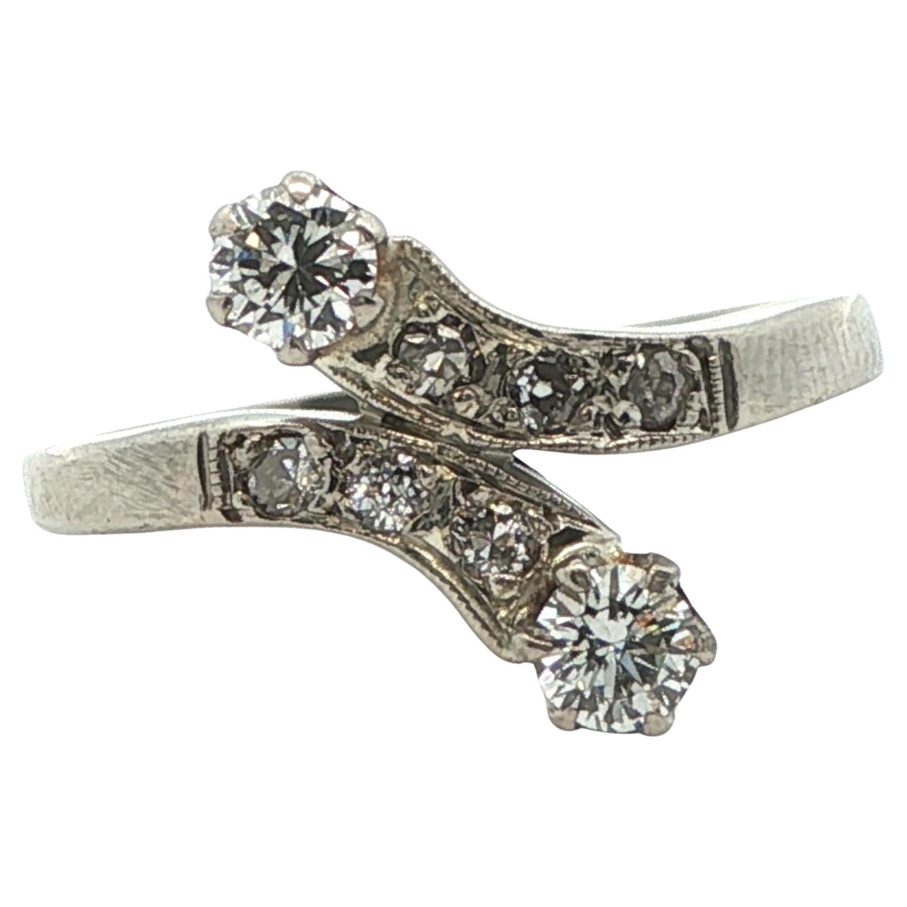 1925 Art Deco Platinum 
Diamond Bypass Ring For Sale
