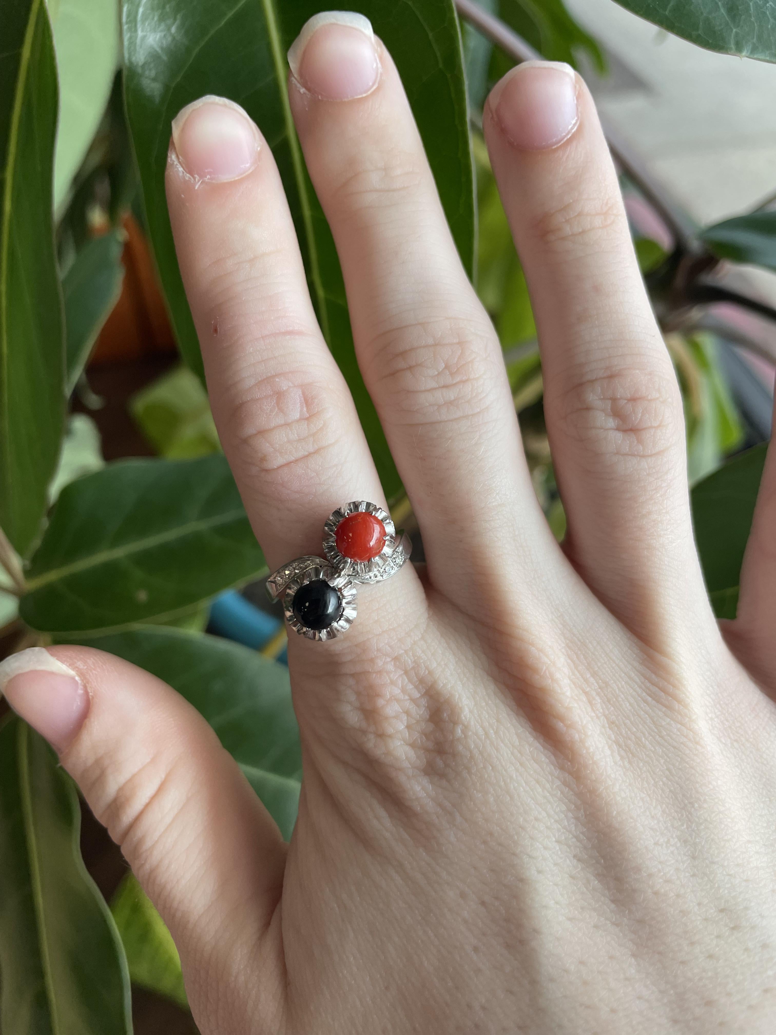 This is an extraordinary 1925 Art Deco Red Coral, Black Jade, and Diamond ring in Platinum. 

We titled this ring after Edvard Munch’s painting, 