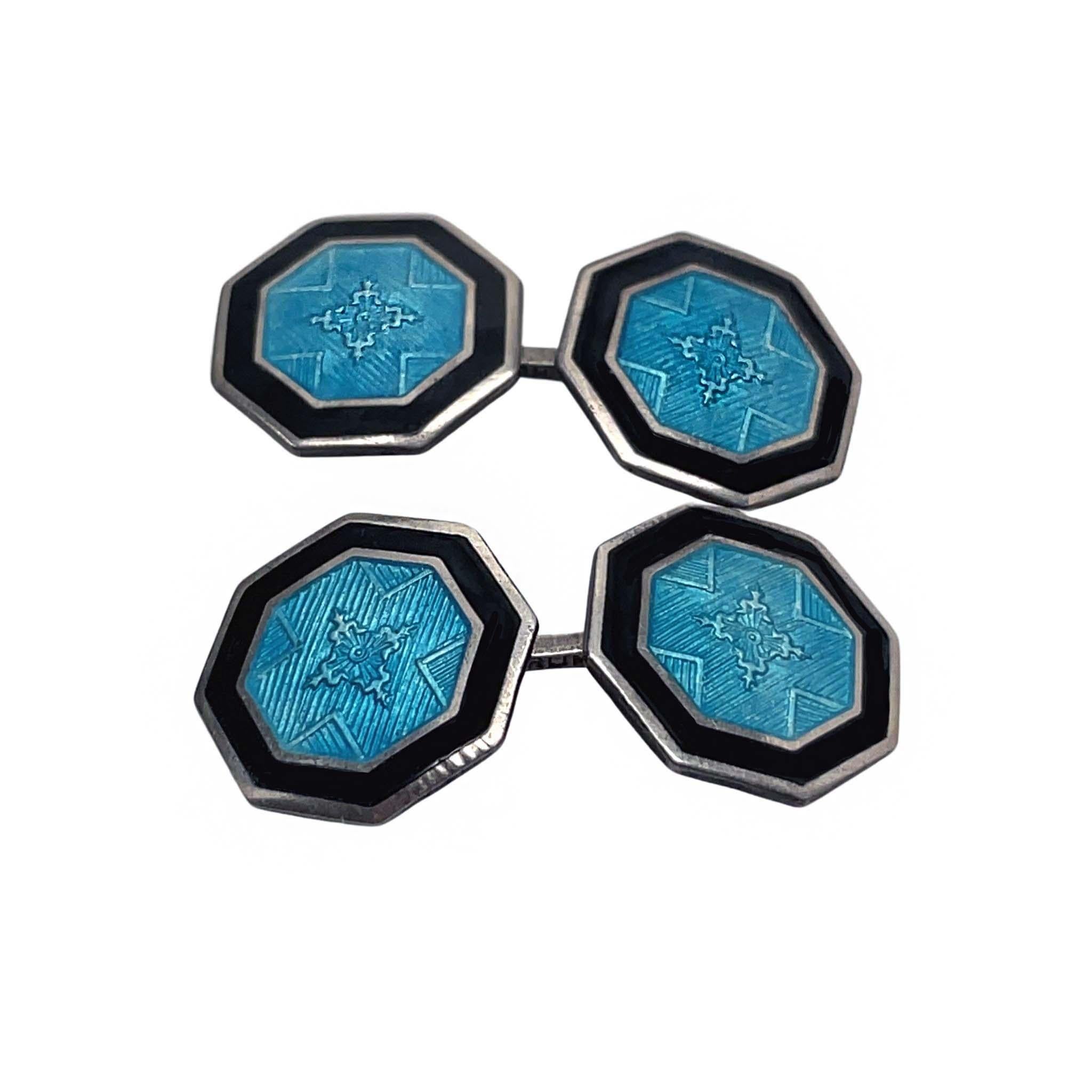 This is a terrific pair of sterling silver Art Deco cufflinks featuring gorgeous bright sky blue guilloche enamel and a dramatic opaque black enamel border! The links have a unique hexagonal shape and would look fantastic on a white shirt and even