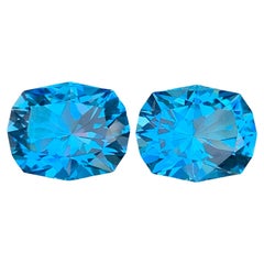 19.25 carats Electric Blue Topaz Pair Hexagon Cut Natural African Gemstones