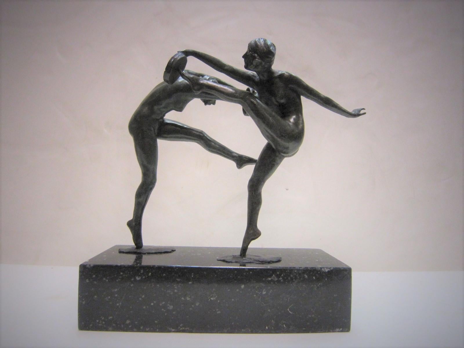 A fine and unusual sculpture of two female nude dancers in motion with tambourines.
Exquisite lost wax cast with each figure bearing the 