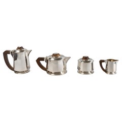 1925 Puiforcat, Tea and Coffee Service in Sterling Silver and Rosewood