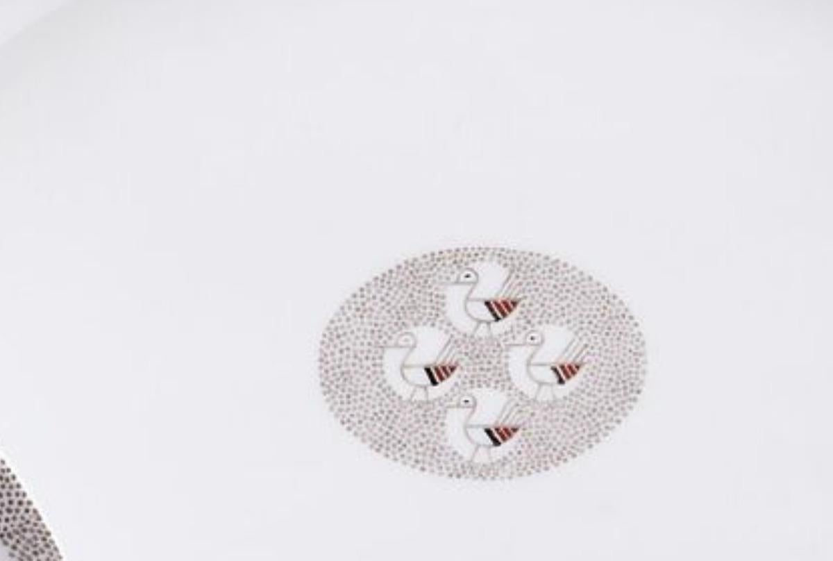 SUZANNE LALIQUE (1892-1989) & THÉODORE HAVILAND (PUBLISHER)
SUZANNE LALIQUE (1892-1989) & THÉODORE HAVILAND (PUBLISHER) 16 dinner plates, 16 dessert plates, 9 soup plates, and 2 serving dishes 

Large porcelain dinner service comprising 43 pieces: