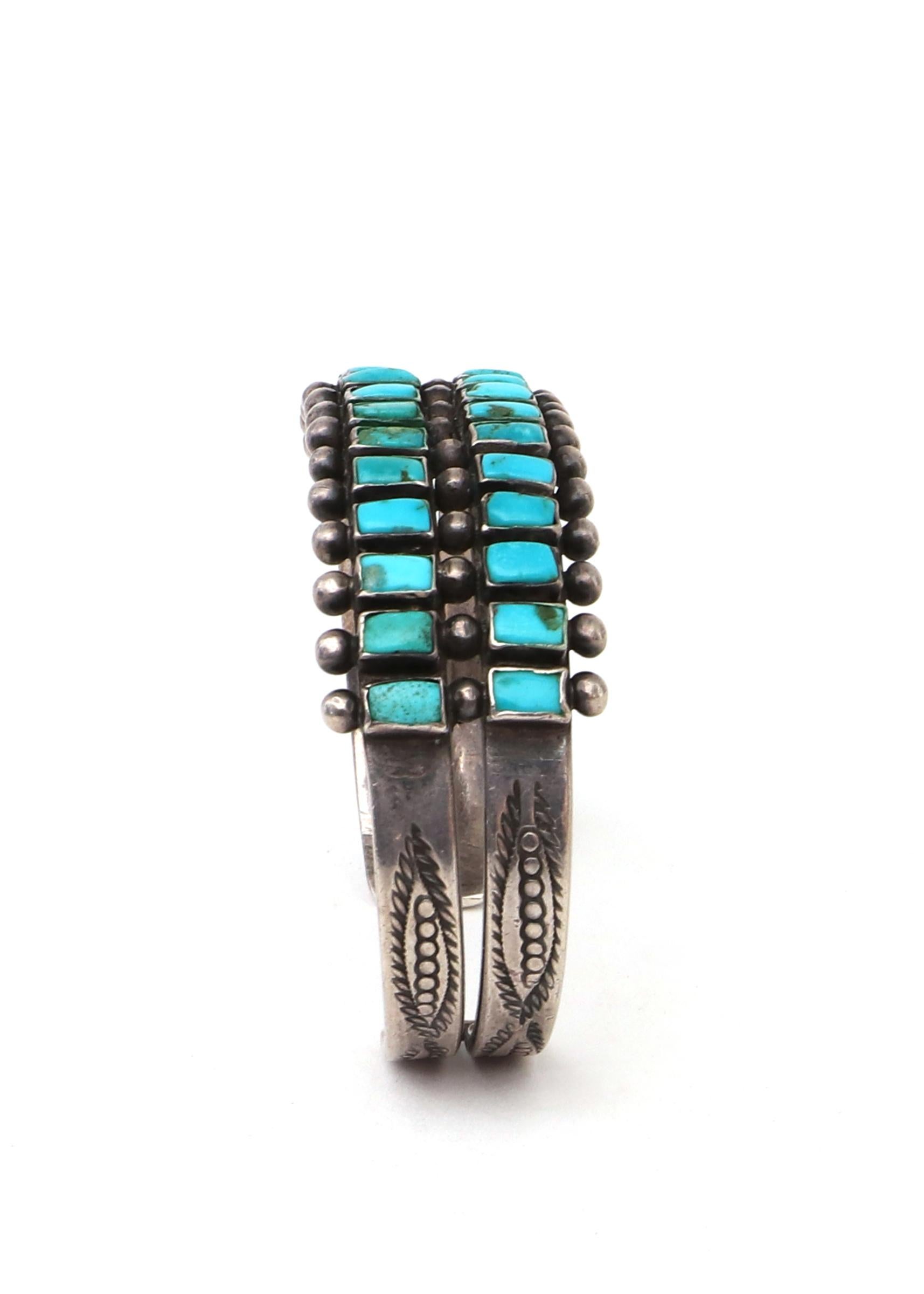 Old Pawn Zuni Pueblo (Native American Indian) cuff bracelet, vintage circa 1925, silver with two rows of square Sleeping Beauty turquoise. The inner bracelet circumference measures approximately 5 ¾ inches with an opening measuring 1 inch (6 ¾