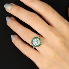1925s Art Deco Calibrated Emeralds Diamond 18 Karat White Gold Solitaire Ring