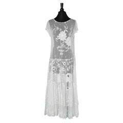 Antique 1925's  white lace dress on a tulle base with one ruffle in the bottom 