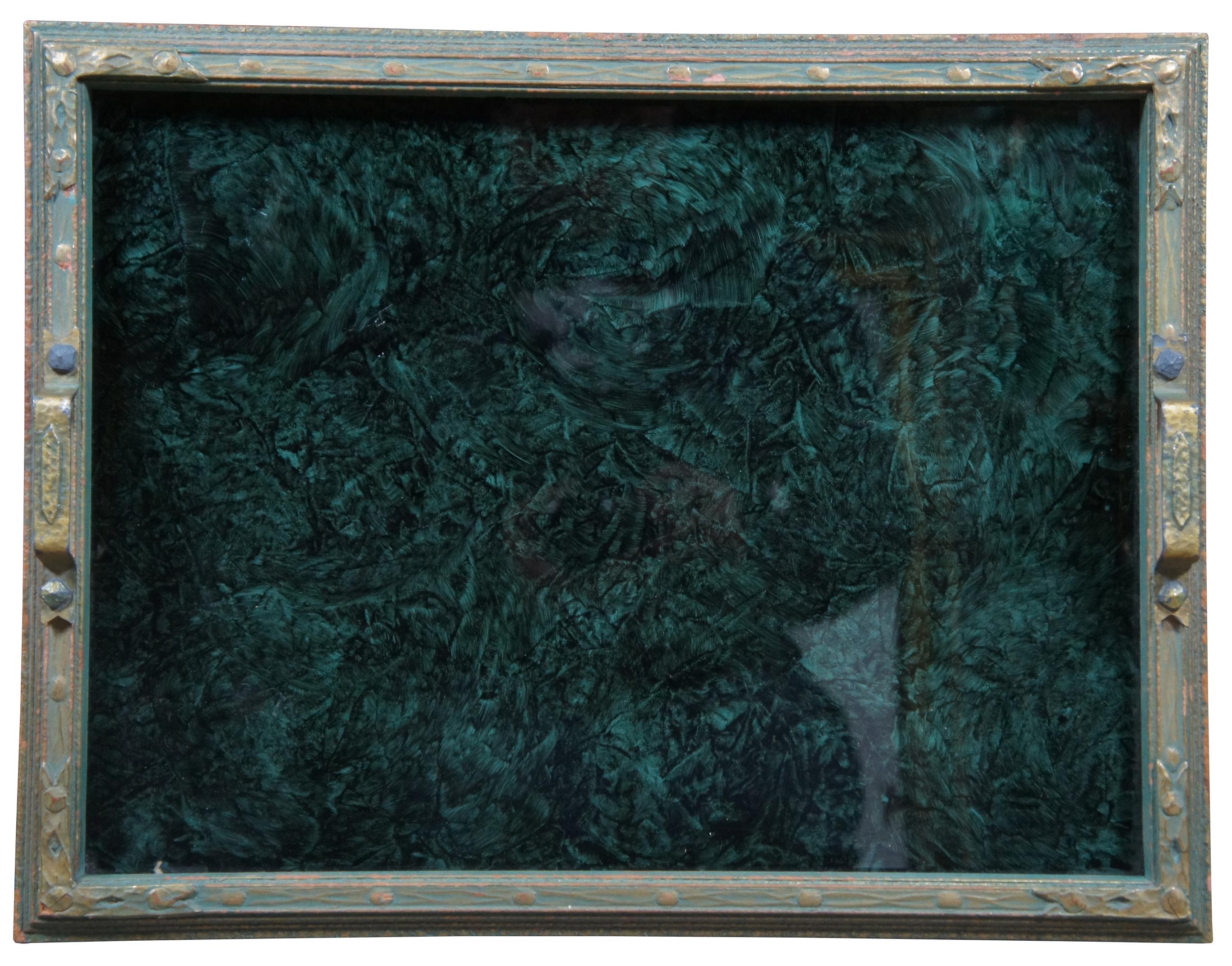 Antique vanity or serving tray with a carved and painted wood frame, brass handles and glass over a green and black marbled surface. Produced by Pieces of 8, trademarked 1926. Measures: 17