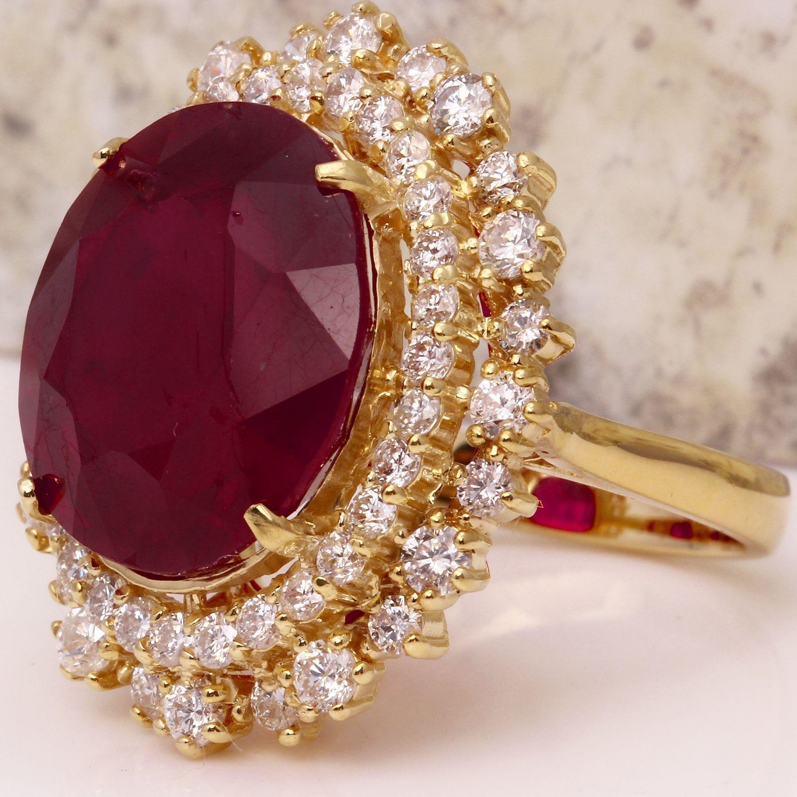 19.26 Carats Impressive Red Ruby and Diamond 14K Yellow Gold Ring

Total Red Ruby Weight is: 17.36 Carats (glass-filled)

Ruby Measures: 15.74 x 13.96mm

Natural Round Diamonds Weight: 1.90 Carats (color G / Clarity VS2-SI1)

Ring size: 6.5 (we
