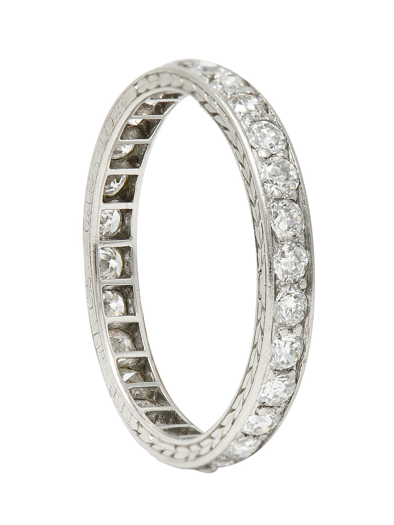 Band ring features bead set old European cut diamonds fully around

Weighing approximately 0.84 carat total - H in color with VS clarity

With engraved wheat motif profile and inscribed 'C.S Oct. 23rd 2926'

Tested as platinum

Signed J.E Caldwell