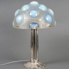 1926 René Lalique, Art Deco Pair of Lamps Soleil Opalescent Glass