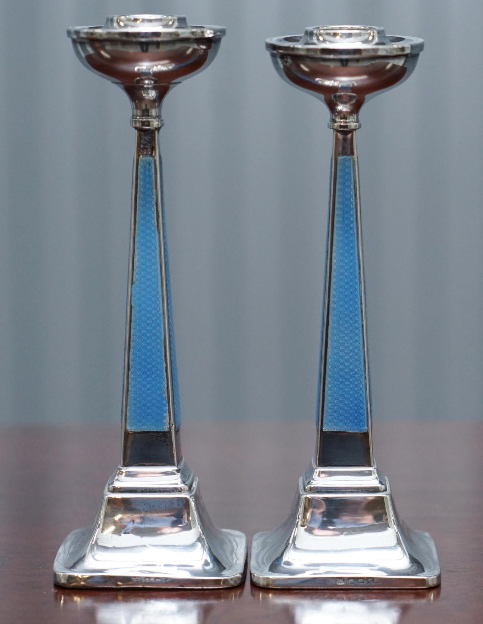 We are delighted to offer for sale this lovely pair of original 1927 Sterling Silver Guilloche Enamel candlesticks by Charles Green & Co

A well made and decorative pair, fully hallmarked 1927, the Birmingham anchor and the sideways facing Lion