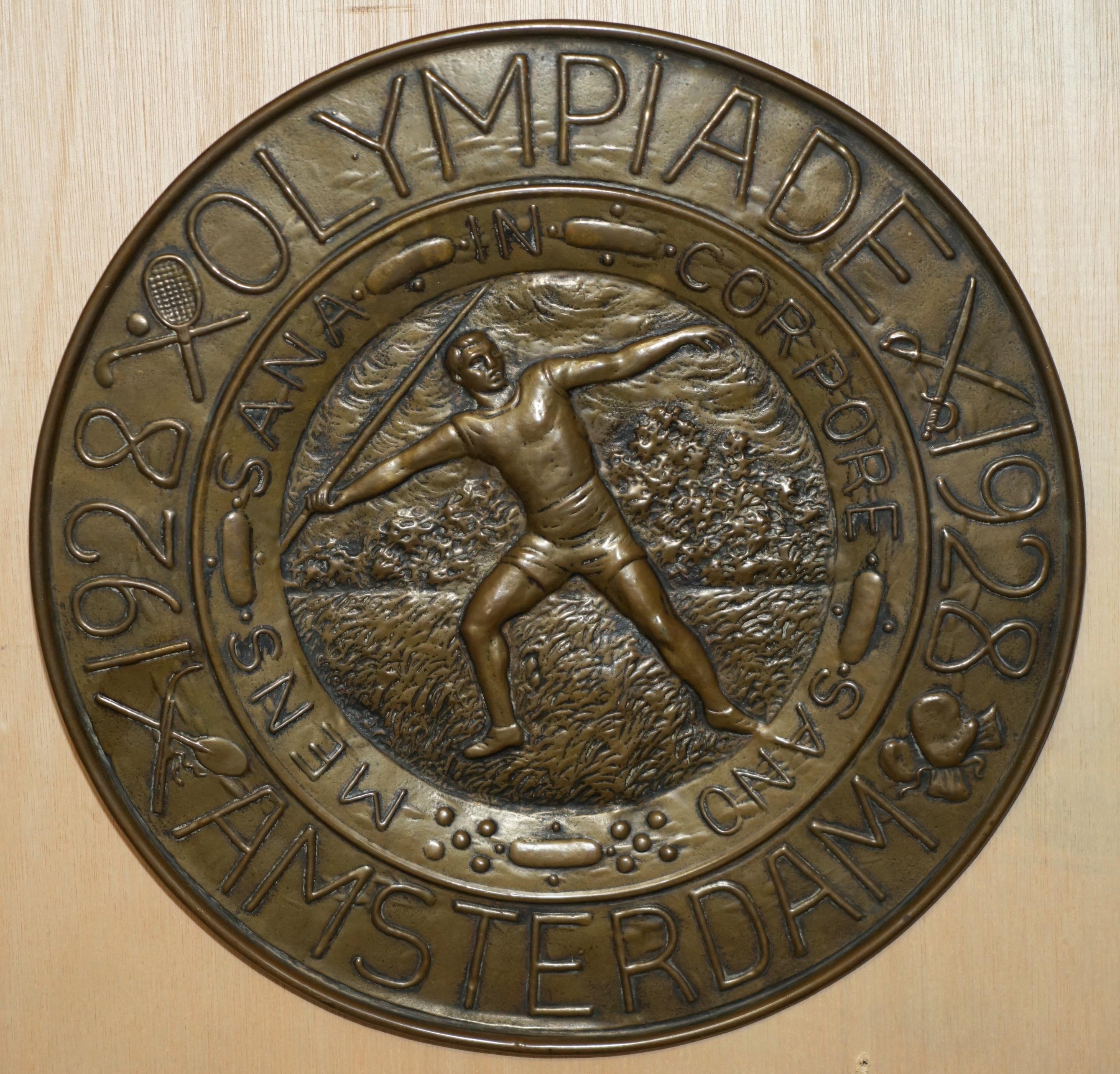 Royal House Antiques is delighted to offer for sale this lovely collectable 1928 Amsterdam Olympics repousse brass hanging wall plaque

A lovely piece of Olympic memorabilia that looks decorative in any setting 

The sport was javelin and I have