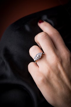 1928 Art Deco - east west cluster of old cut diamonds