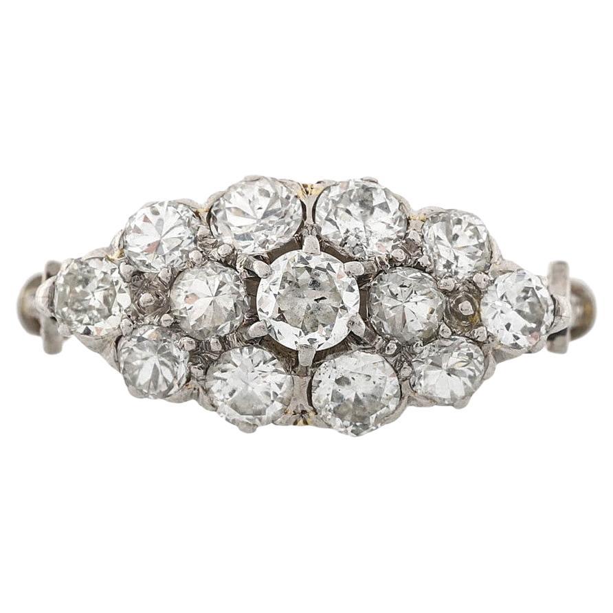 1928 Art Deco - east west cluster of old cut diamonds