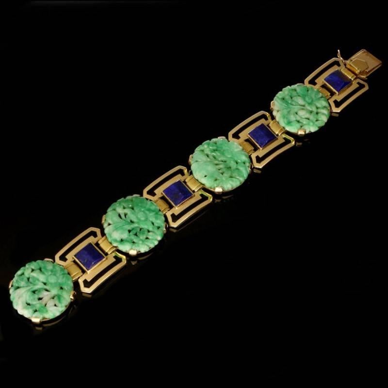 18 Carat Yellow Gold, clearly signed Gérard Sandoz of Maison Gustave Sandoz, with French assay marks for 18 carat gold and with the makers mark for Georges Lenfant.
Jadeite jade and lapis lazuli
18cm/7.2inches long x 2.5cm/1inch wide
65 grams

An