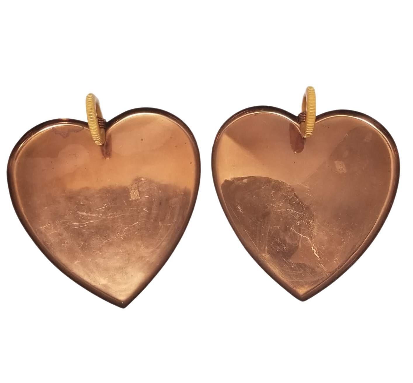 Elevate your entertaining with these vintage (circa 1928s) copper heart-shaped tray by Chase USA, adorned with Art Deco style and Bakelite handles. This piece, signed with the iconic centaur drawing a bow and 'CHASE USA,' bears the marks of time,