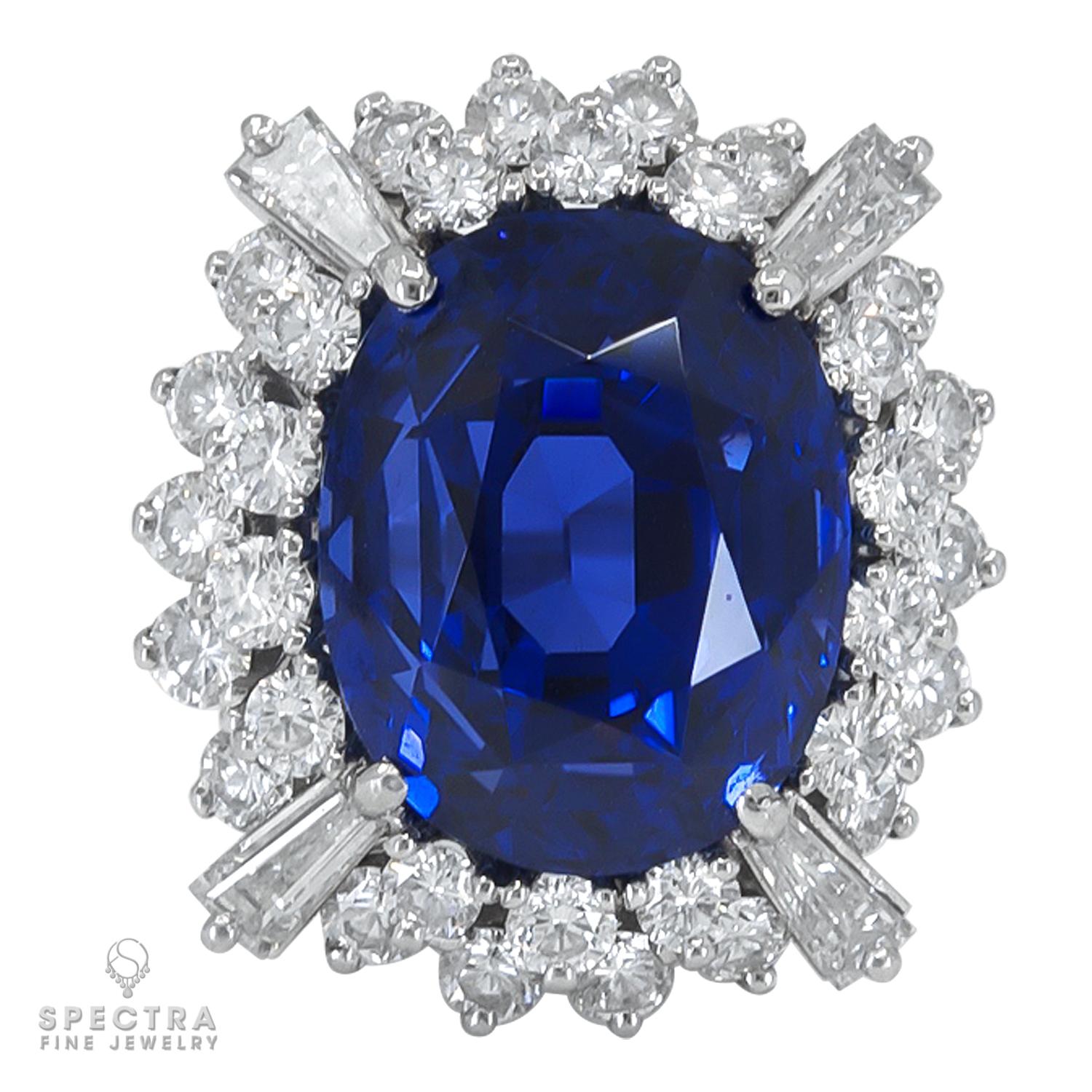 A beautiful cocktail ring set with a 19.28 carat oval blue sapphire, accented by 32 rose-cut diamonds and 4 baguette-cut diamonds.
Art Deco inspired.
The sapphire is certified by AGL stating that it's of Ceylon origin with no indication of thermal