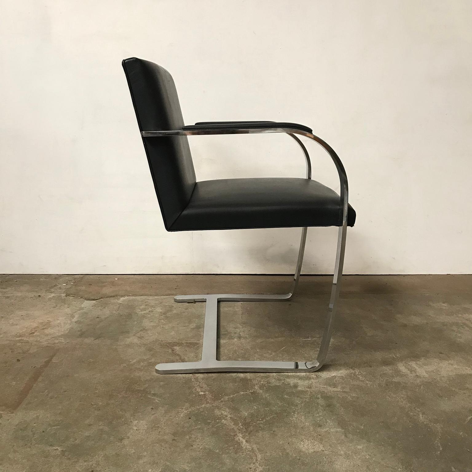 Brno in black. Beautiful chair with strong but elegant design and fits in every interior. The chair shows some minor traces of wear like wear on the corners on top of the back (picture #13) and on the armrests (#10 and #11). The base is in good