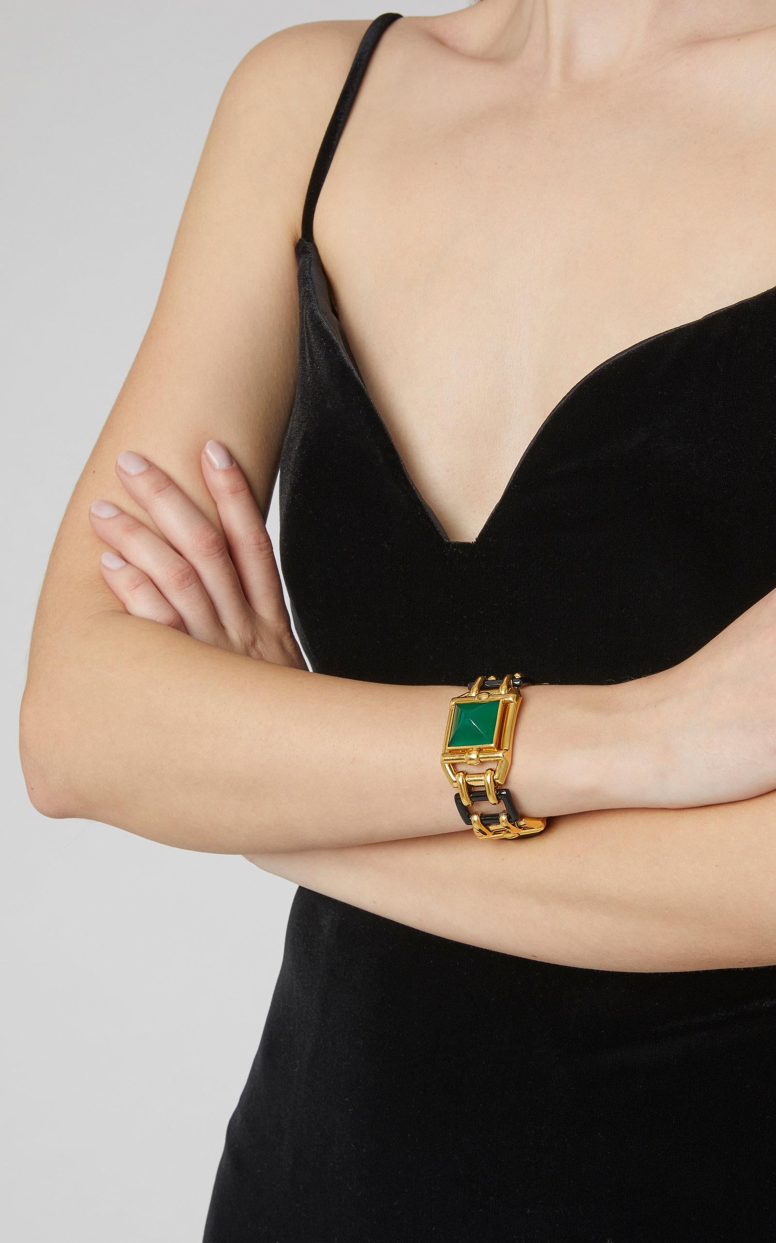An Art Deco Bracelet by Walser Wald (in its original box) with interlinked elements in chrysophrase, onyx and gold. French Exportation marks, circa 1928.