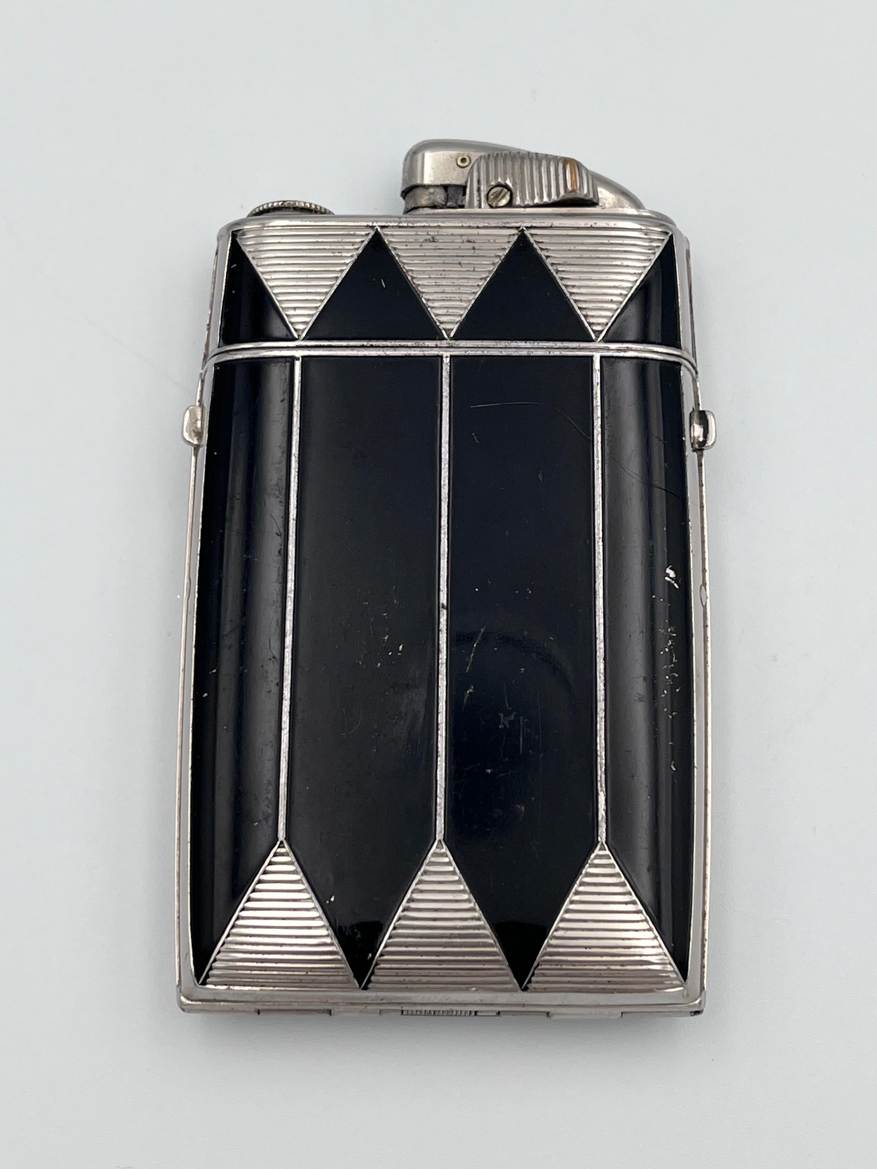 1929 Art Deco Evans Case Company Black Enamel Dual Cigarette Case & Lighter, Cecil Lawrence

This rare 1929 Art Deco cigarette case and lighter combination by the renowned Evans Case Company exemplifies the sleek innovation and modern glamour of the
