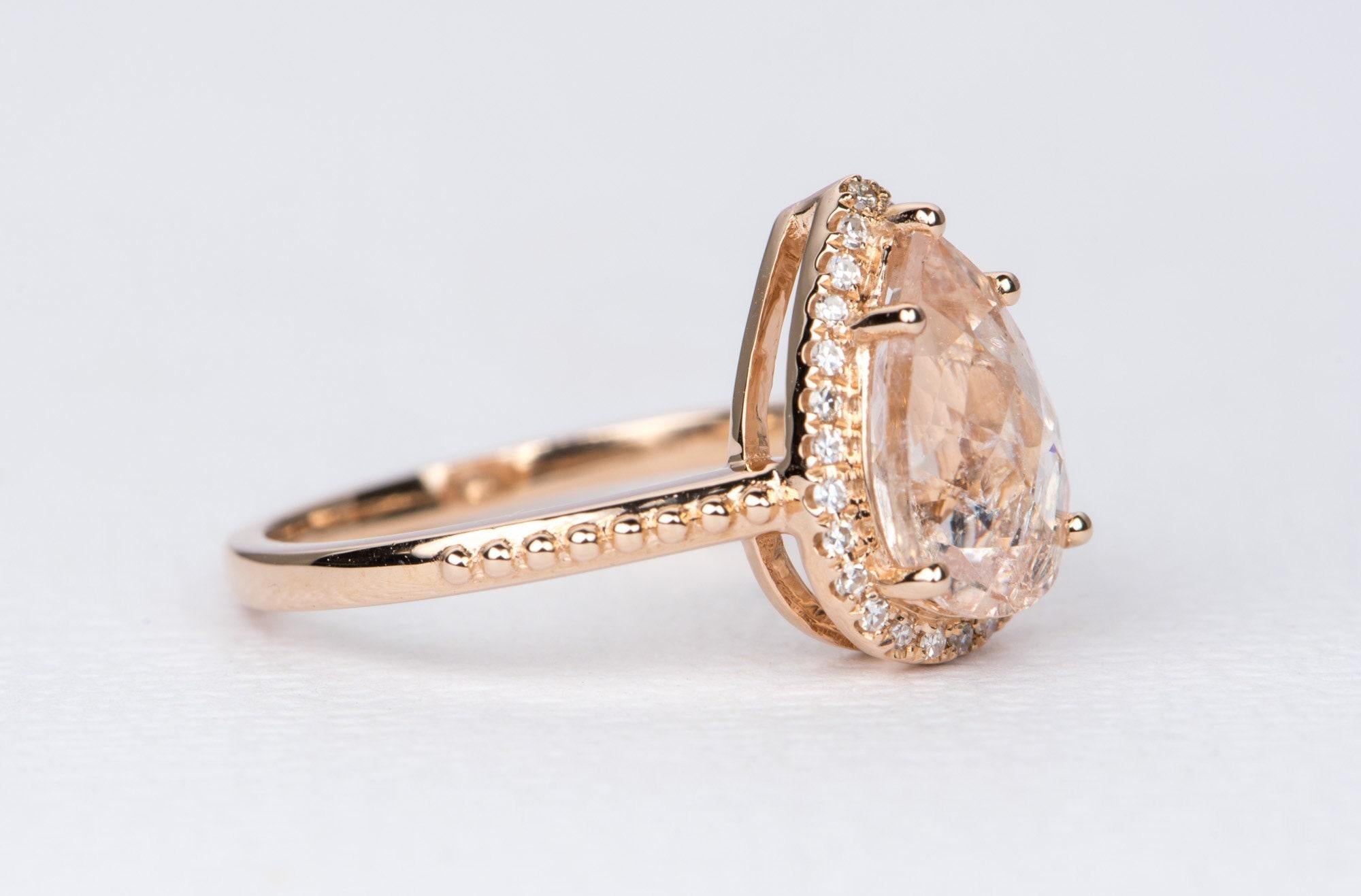 14k rose gold pear shape csarite ring with chocolate diamond accents