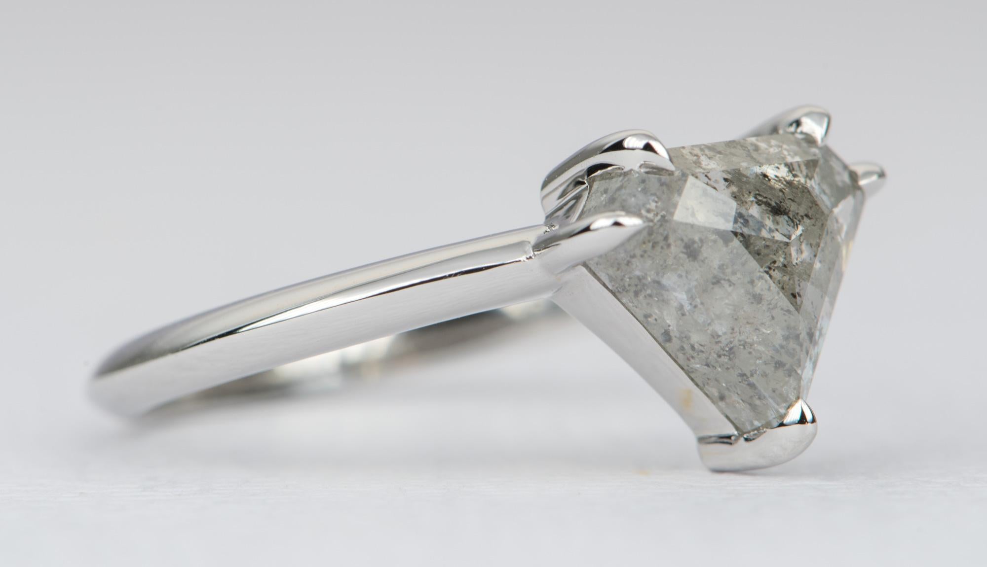 ♥  Solid 14K white gold ring set with a shield-shaped salt and pepper diamond 
 ♥  The knife edge band gives this ring a modern look
 ♥  The overall setting measures 10.5mm in width, 9.1mm in length, and sits 5.2mm tall from the finger
 
 ♥  US Size