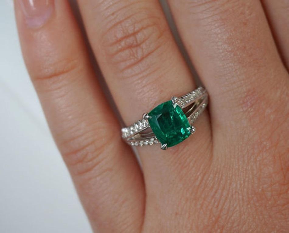 Emerald Weight: 1.93 CT, Measurements: 8.5 x 7 mm, Diamond Weight: 0.35 CT (1.3-1.4 mm), Metal: 18K White Gold, Gold Weight: 6.70 gm, Ring Size: 6, Shape: Cushion, Color: Vivid Green, Hardness: 7.5-8, Birthstone: May