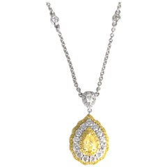 Pendentif en forme de poire de couleur jaune fantaisie naturelle certifié par le GIA et serti d'un diamant de 1,93 carat
