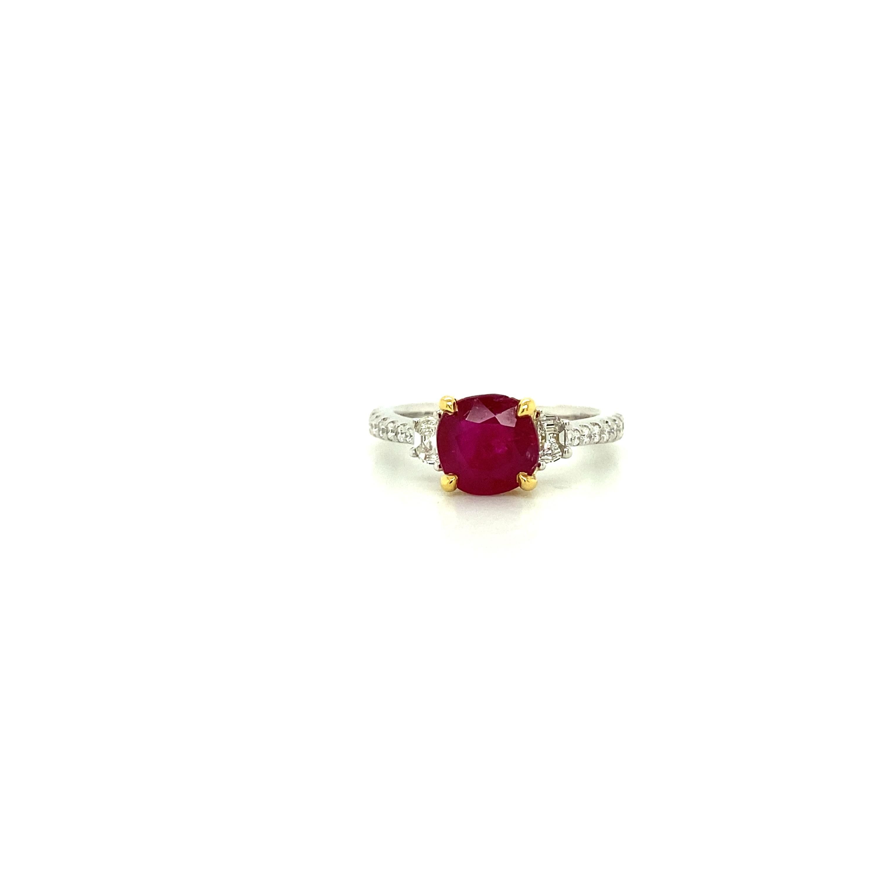 1.93 Carat GIA Certified Unheated Vivid Red Burmese Ruby and Diamond Gold Ring:

A gorgeous jewel, it features a 1.93 carat GIA certified unheated pigeon's blood red cushion-cut Burmese ruby with two white baguette diamonds on the sides weighing