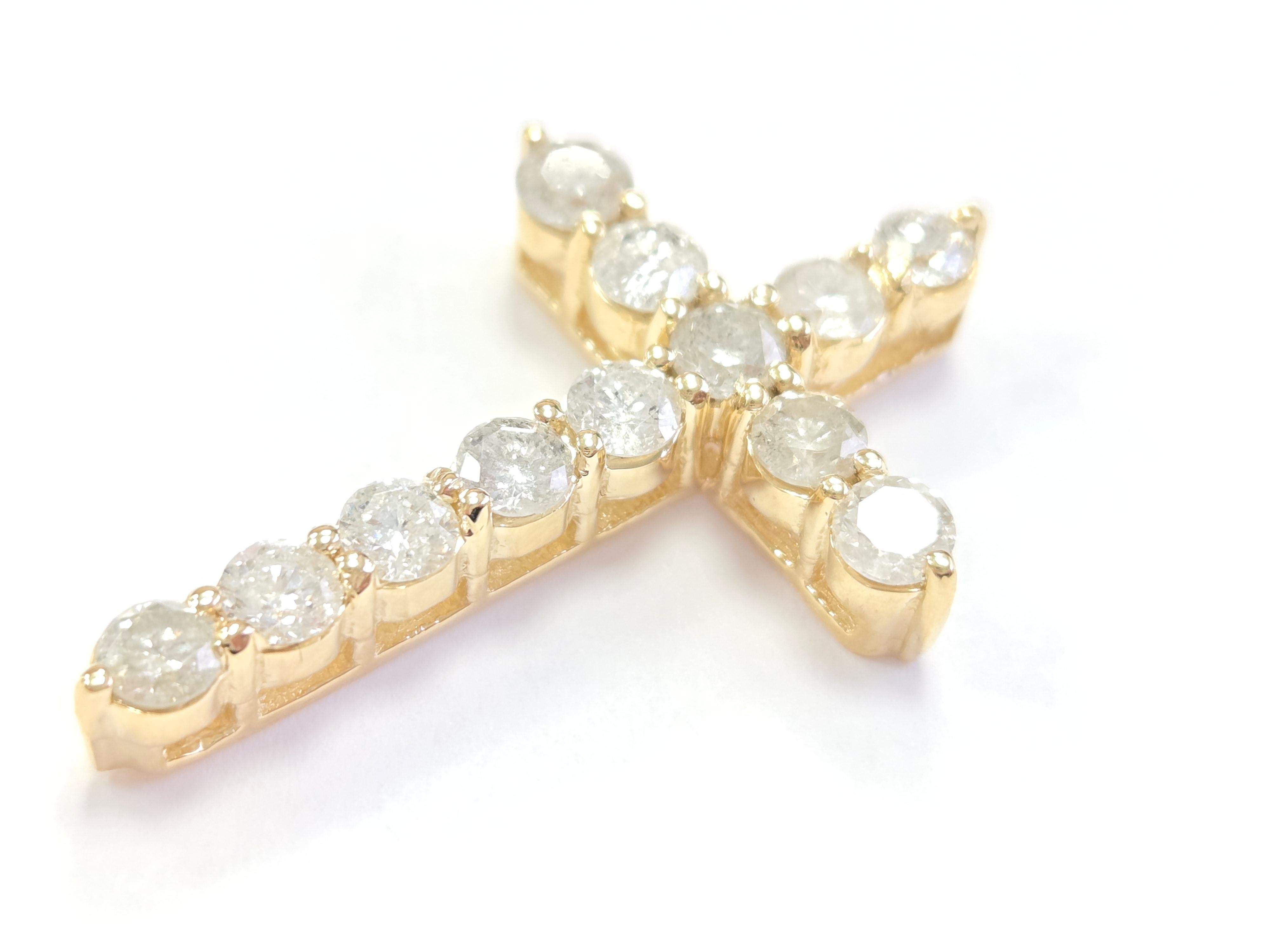 Beautiful 1.93 Carat Natural Diamond Cross Pendant 14 Karat Yellow Gold, very sparkly and shiny look.

Carat Weight: 1.93 carats, which is a noticeable size and adds a beautiful brilliance to the pendant.

Natural Diamonds: 12 pieces, meaning each